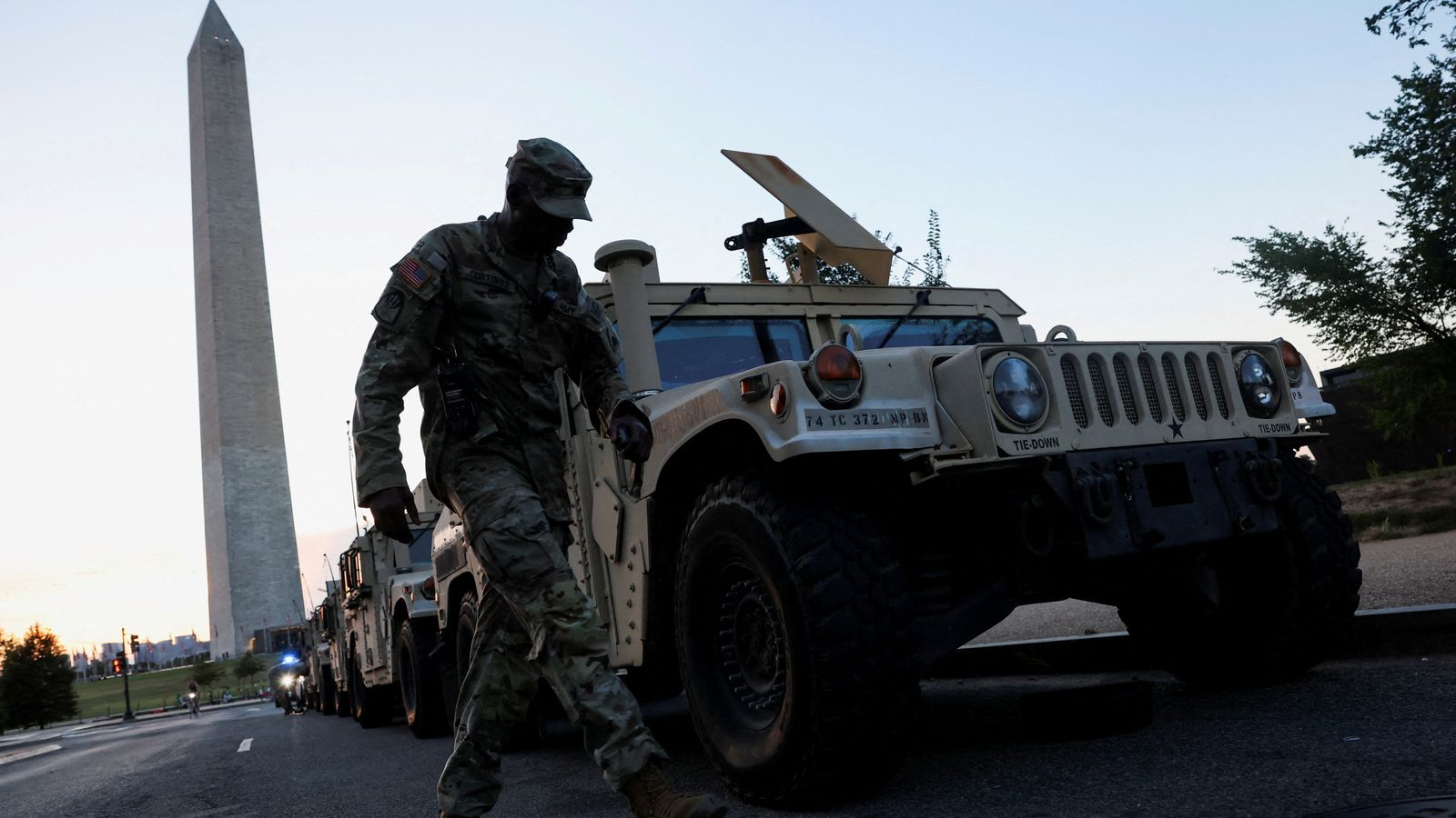 The National Guard parks close to the Washington Monument as the deployment begins